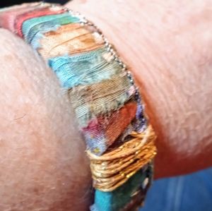 Bangles made.woth hand painted material and fibers